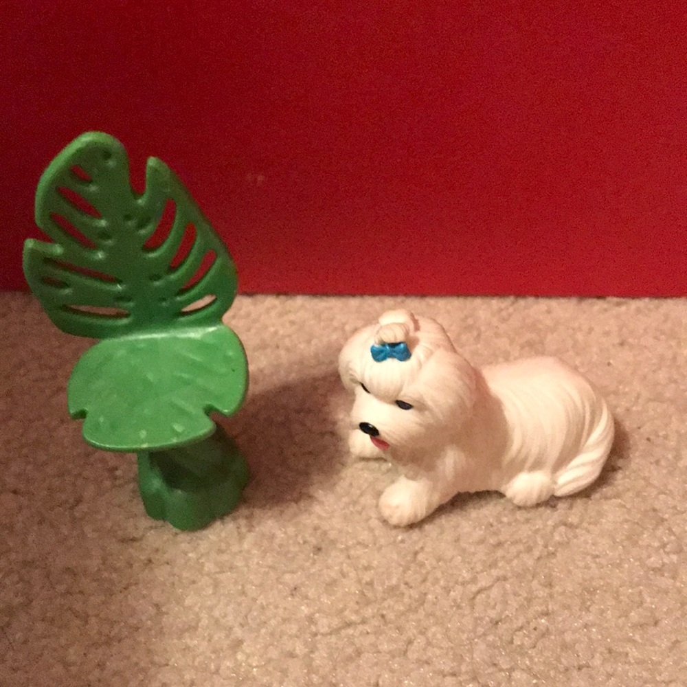 A Chair and a toy dog